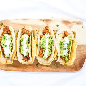 CHIPOTLE JACKFRUIT TACOS WITH SIMPLE GUAC AND LEMON ORANGE CREMA