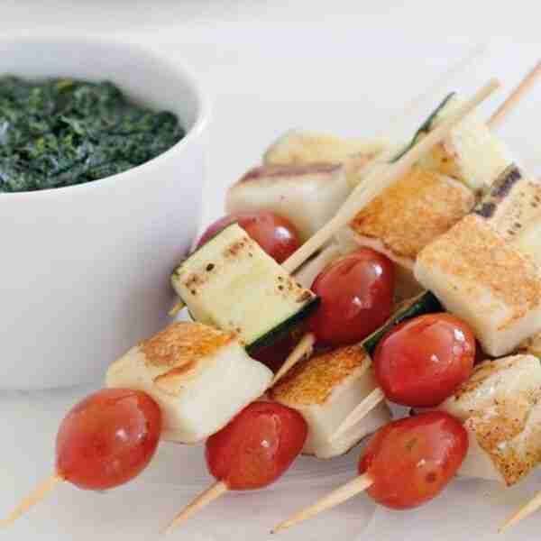 Haloumi, zucchini and grape-tomato skewers with basil oil