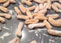 SWEET POTATO CAVATELLI WITH SAUSAGE, PANCETTA, FRIED SAGE, AND SAUTÉED WILD MUSH