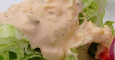Homemade Thousand Island Dressing over Iceberg Lettuce